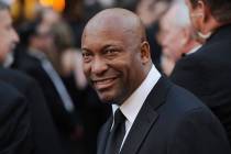 FILE - In this Feb. 24, 2008 file photo, director John Singleton arrives at the 80th Academy Aw ...