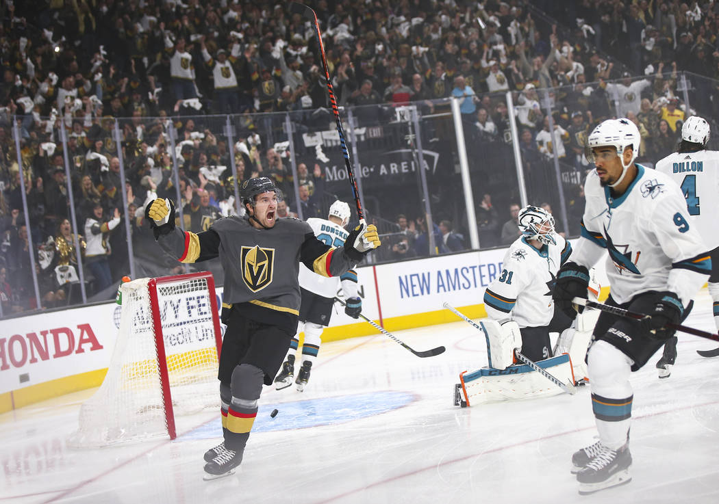 Golden Knights right wing Mark Stone (61) celebrates a goal by left wing Max Pacioretty, not pi ...