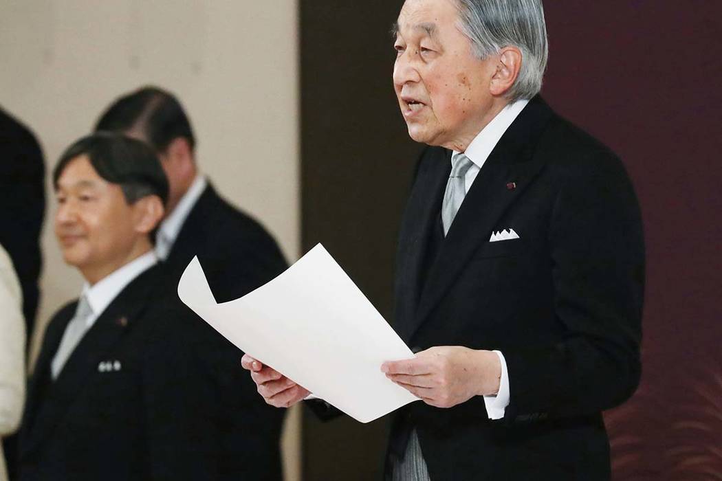Japan's Emperor Akihito speaks during the ceremony of his abdication in front of other members ...