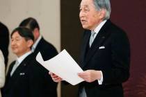 Japan's Emperor Akihito speaks during the ceremony of his abdication in front of other members ...