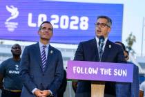 FILE - In this July 31, 2017, file photo, Los Angeles Mayor Eric Garcetti, left, listens as Los ...