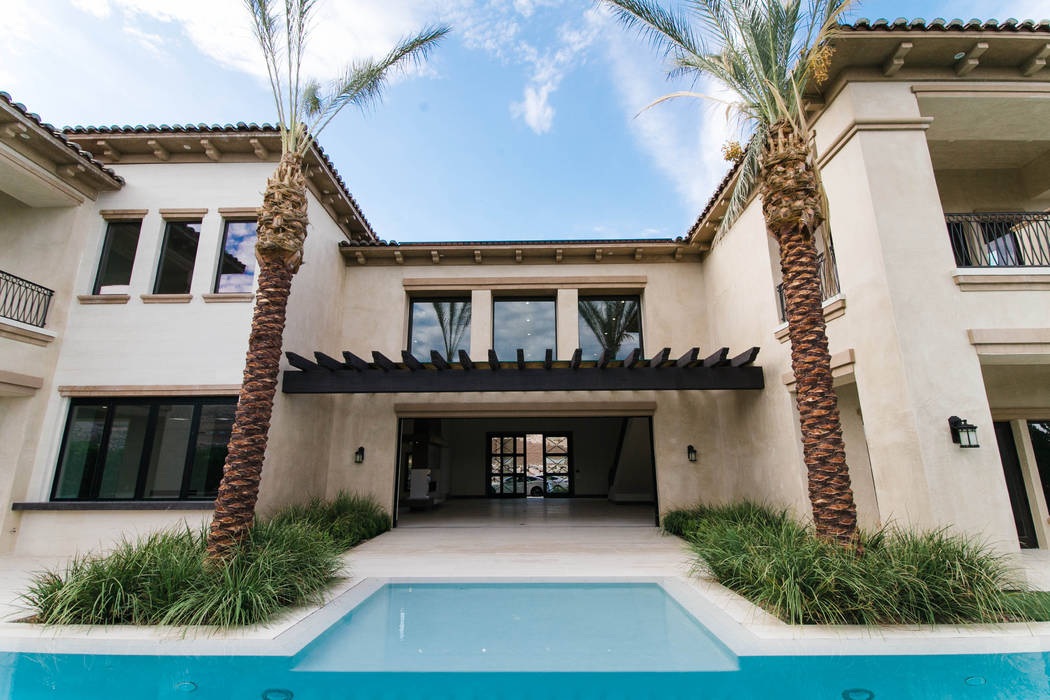 Growth Luxury Homes The two-story home measures 9,825 square feet.
