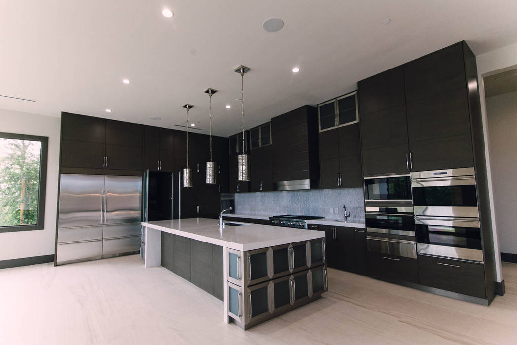 The kitchen has smart technology. (Growth Luxury Homes)