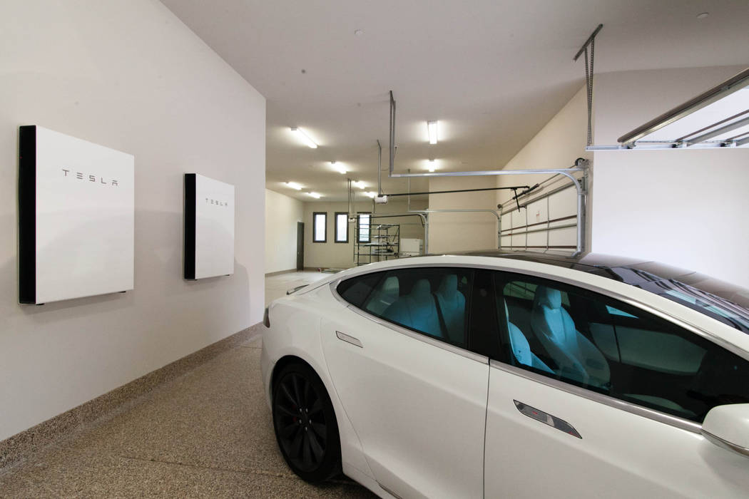 The home at 27 Shadow Canyon Court in Southern Highlands has a six-car garage designed for Tesl ...