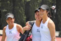 En-Pei Huang, Connie Li and Aiwen Zhu celebrate Saturday after helping UNLV to a 4-3 victory ov ...