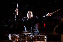Tito Puente Jr. performs before an NBA basketball game between the Miami Heat and San Antonio S ...