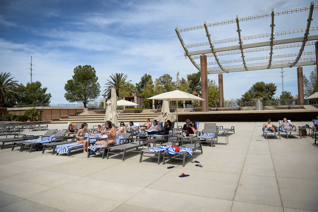 People relax out at the pool at the M Resort in Henderson, Thursday, April 4, 2019. (Caroline B ...
