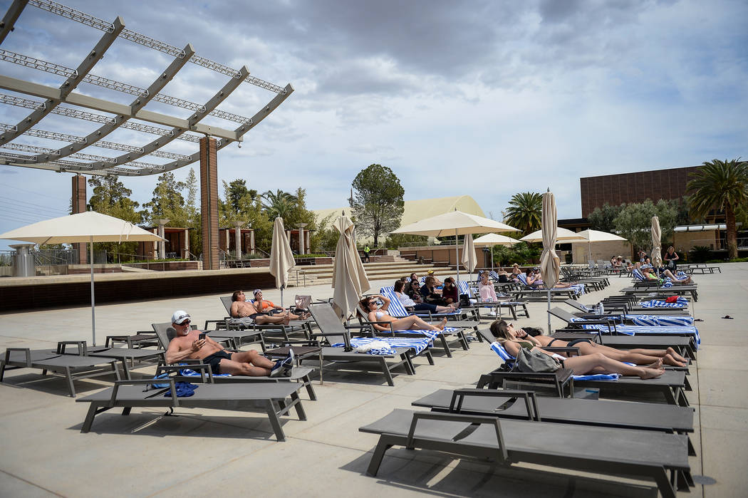 People relax out at the pool at the M Resort in Henderson, Thursday, April 4, 2019. (Caroline B ...