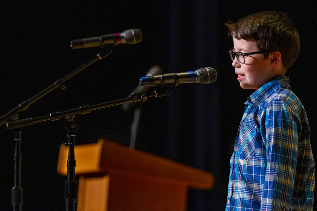 Forbuss Elementary School student Reed Hambly performs "Purple, Green and Yellow" dur ...