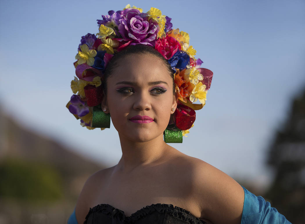 Ashley Galvez, Carnaval Queen Infantil 2018 at Carnaval Internacional Mardi Gras, watches a per ...