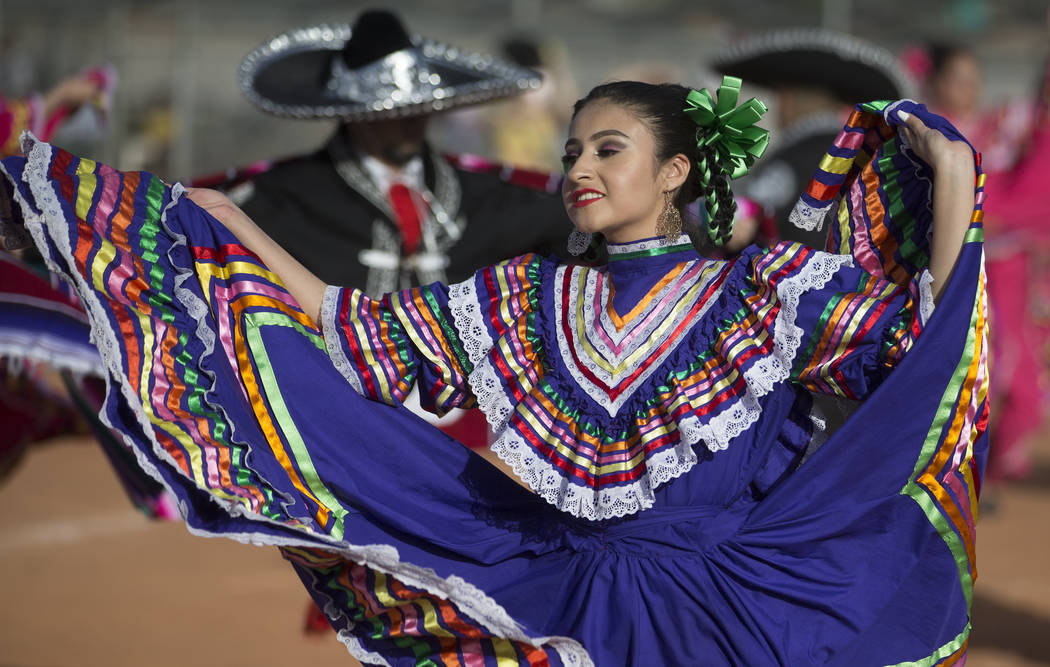 Mariajose Valdez, a dancer with Federación de Poblanos en Las Vegas performs during a Cinco de ...