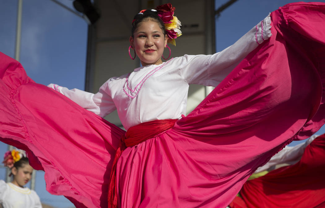 Andrea Gonzalez with Federación de Poblanos en Las Vegas perform during a Cinco de Mayo festiv ...