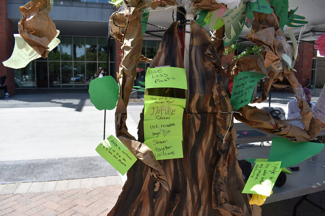 The Pledge Tree at the Earth Day event, where students posted ways they would try to protect th ...