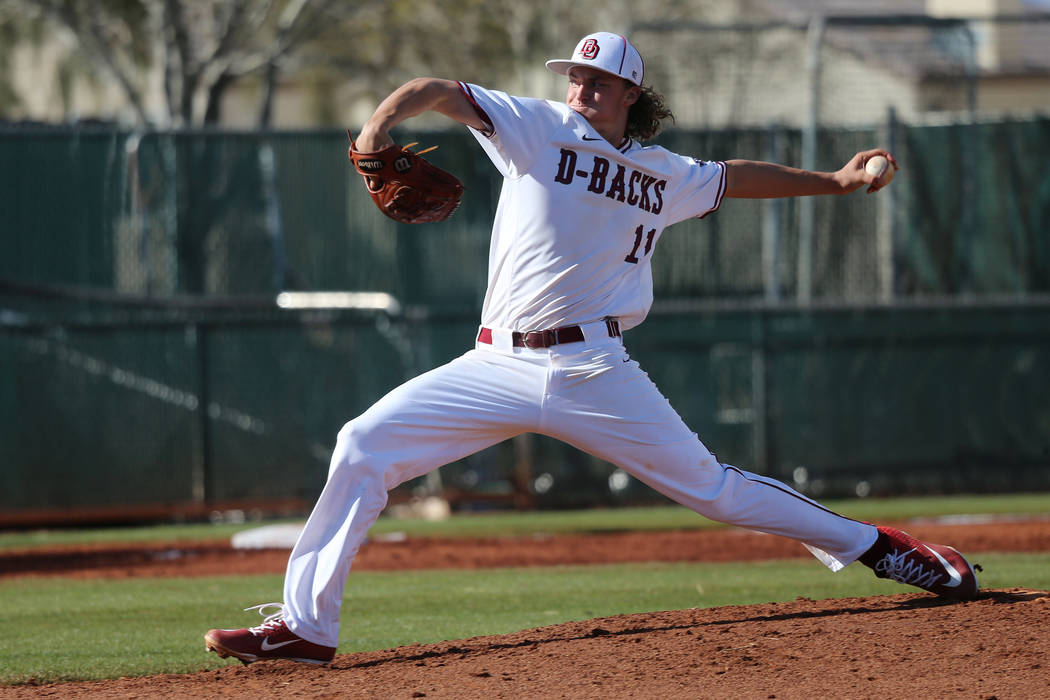 Desert Oasis' Josh Sharman (11) pitches against Palo Verde in the baseball game at Desert Oasis ...