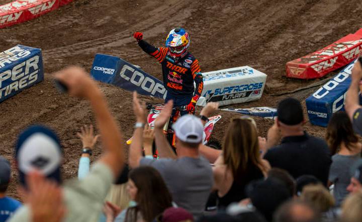 Red plate points leader Cooper Webb (2) greets the fans before the featured 450 SX class race a ...