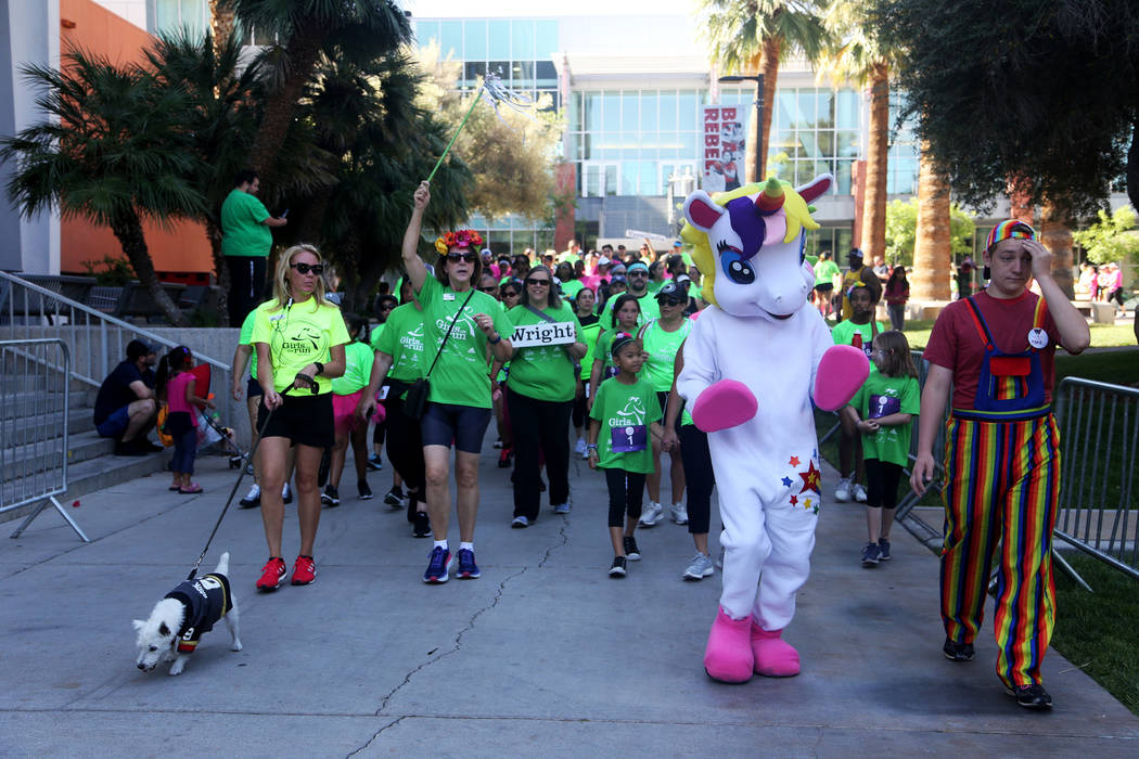 Participants walk to the starting line at the Girls on the Run Las Vegas 5K at UNLV in Las Vega ...
