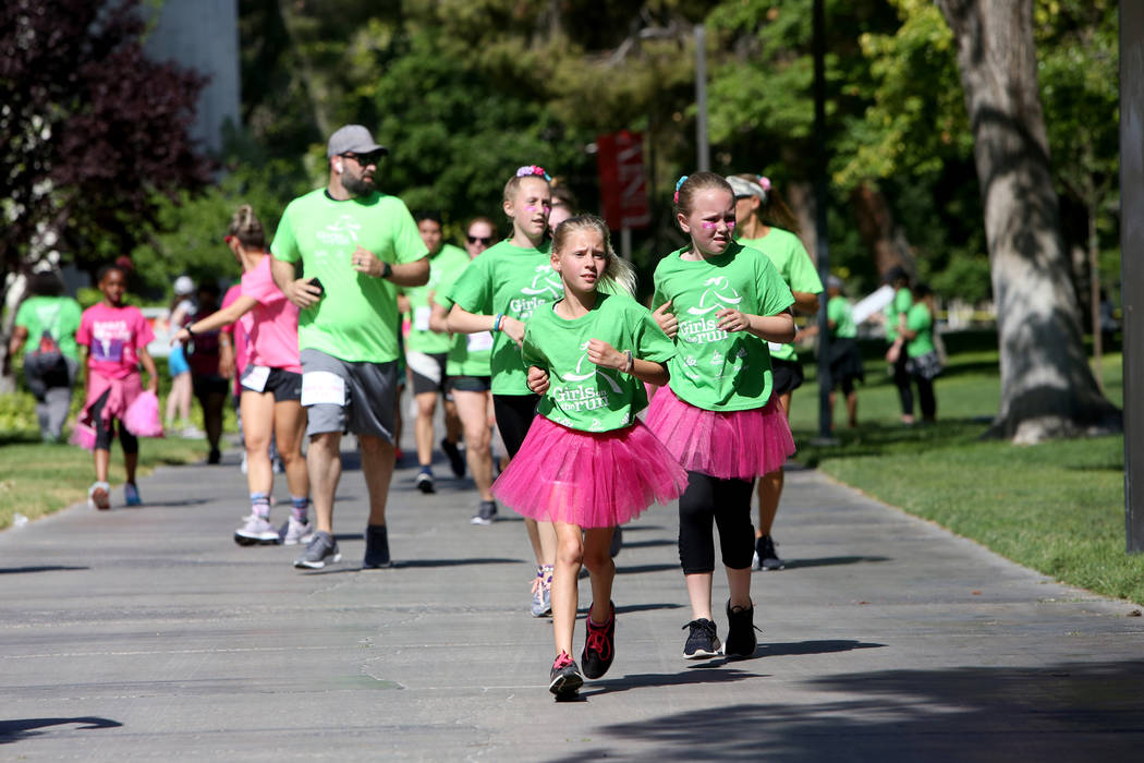 Participants run at the Girls on the Run Las Vegas 5K at UNLV in Las Vegas, Sunday, May 5, 2019 ...