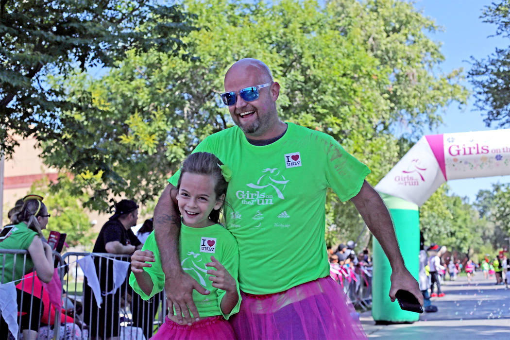 Participants finish the Girls on the Run Las Vegas 5K at UNLV in Las Vegas, Sunday, May 5, 2019 ...