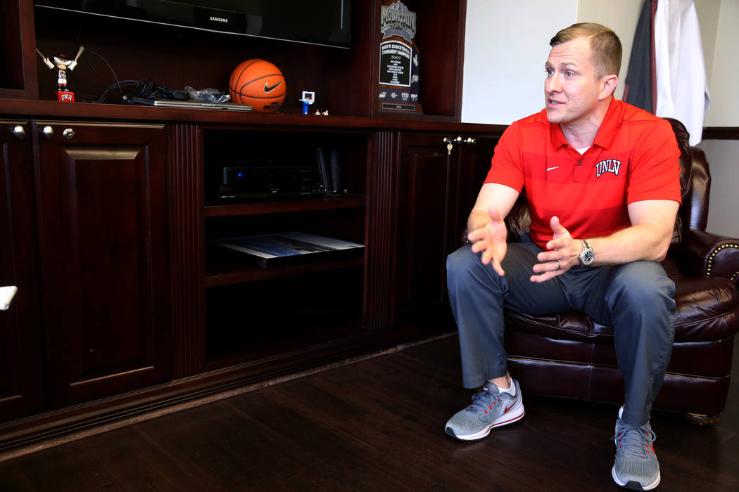 New UNLV basketball coach T.J. Otzelberger talks to a reporter in his office at the Thomas &amp ...