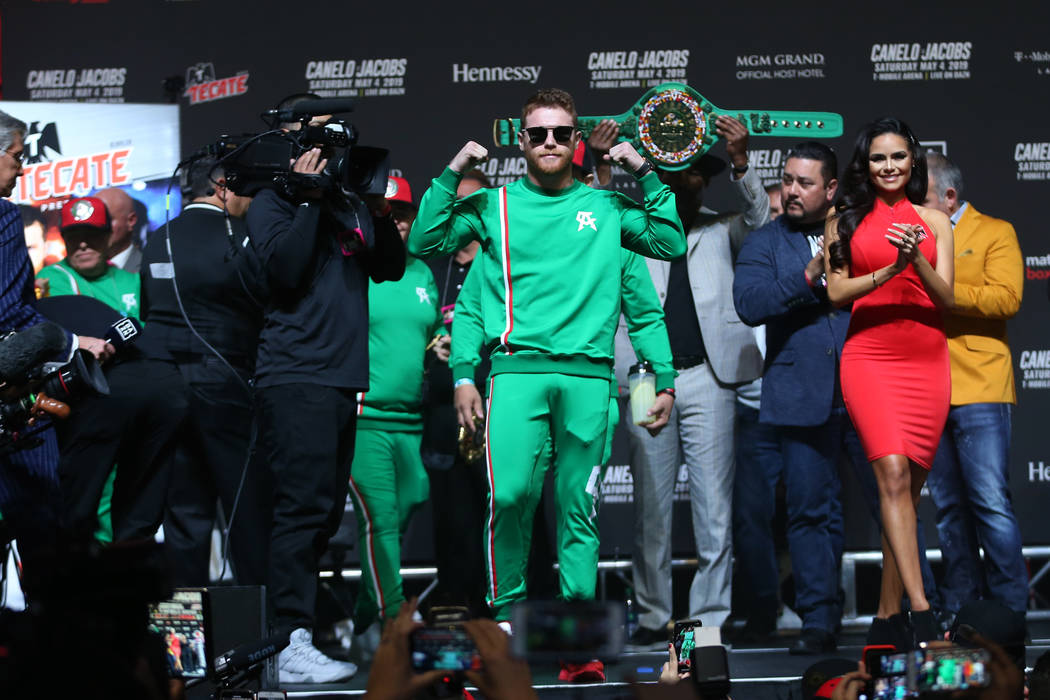 Saul "Canelo" Alvarez takes the stage for his weigh-in at T-Mobile Arena in Las Vegas ...