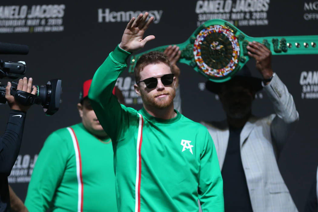 Saul "Canelo" Alvarez takes the stage for his weigh-in at T-Mobile Arena in Las Vegas ...