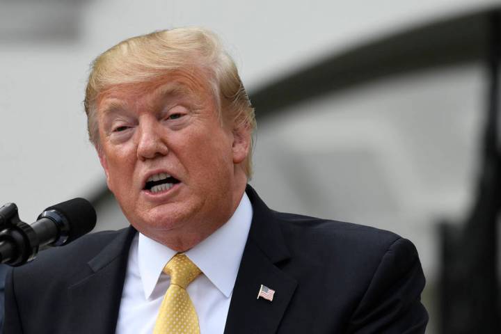 President Donald Trump speaks on the South Lawn of the White House in Washington, Tuesday, Apri ...