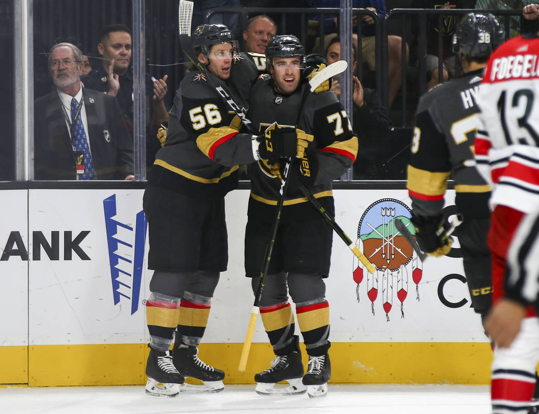 Golden Knights defenseman Brad Hunt (77) celebrates his goal against the Carolina Hurricanes wi ...