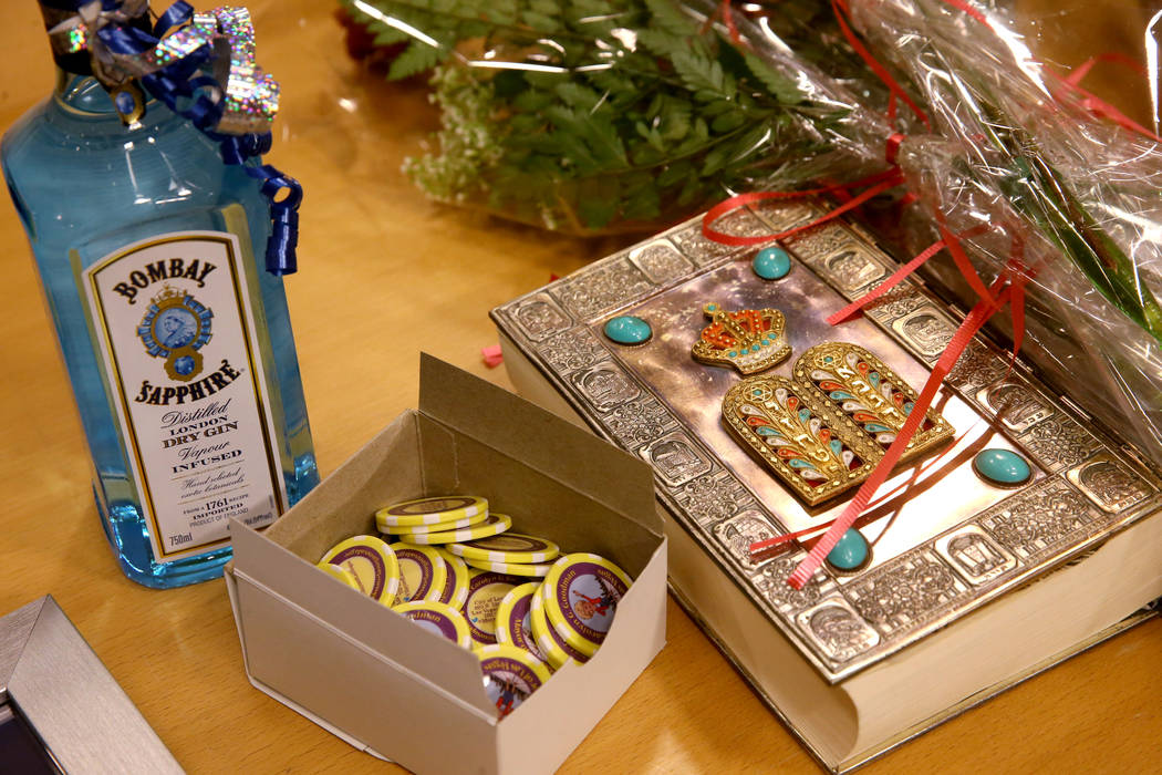 Commemorative poker chips, gin, flowers and a Bible wait for the swearing in of Las Vegas Mayor ...