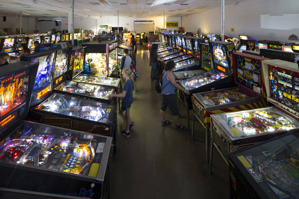 Patrons visit the Pinball Hall of Fame located at 1610 E. Tropicana Avenue in Las Vegas on Satu ...