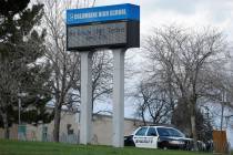 FILE - In this April 17, 2019, file photo, a patrol car is parked in front of Columbine High Sc ...