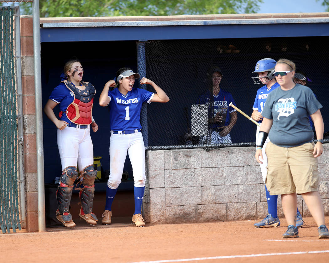 Basic's Angela Santillanes (6), left, and Giovanna Nicolosi (1) in the cheer a hit against Sier ...