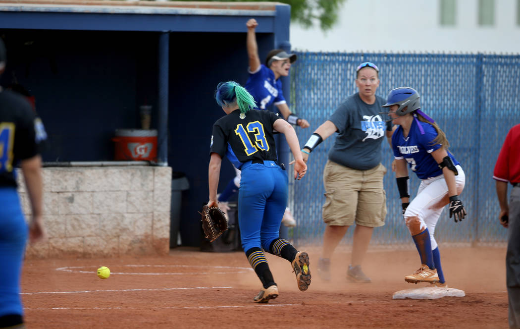 Basic's Shelby Basso (7) is safe on third base as Sierra Vista's Daelynn Hilton (13) gathers th ...