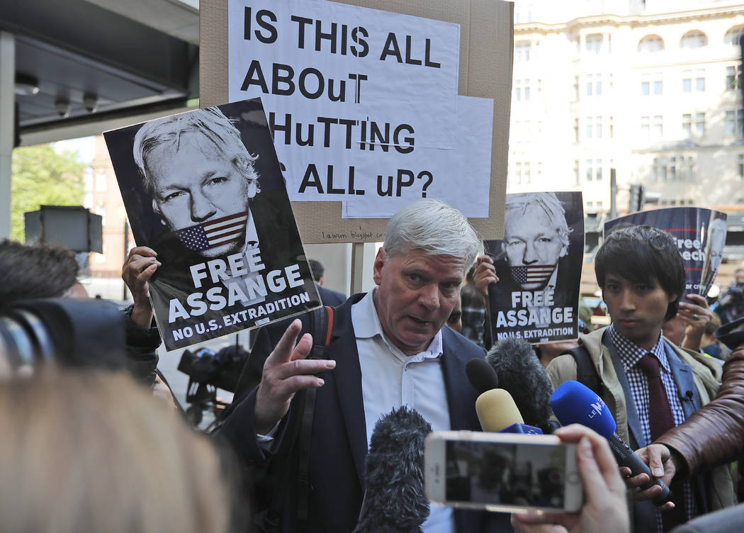 Kristinn Hrafnnson, Wikileaks editor in chief, addresses the media at the entrance to Westminst ...