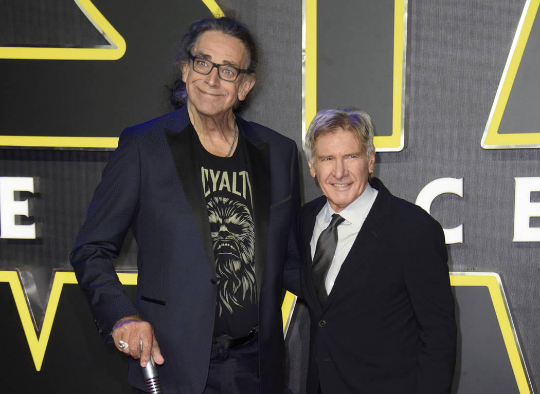 Peter Mayhew, left, and Harrison Ford at the European premiere of the film 'Star Wars: The Forc ...