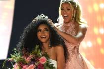 Miss North Carolina Cheslie Kryst gets crowned by last year's winner Sarah Rose Summers after w ...