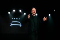 Tesla CEO Elon Musk speaks March 14, 2019, before unveiling the Model Y at Tesla's design studi ...