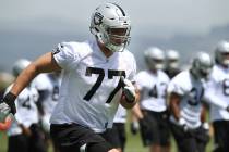 Oakland Raiders' Kolton Miller (77) runs during an NFL football practice on Friday, May 4, 2018 ...