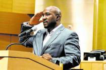 Las Vegas City Councilman Ricki Y. Barlow salutes after announcing his resignation during a pre ...