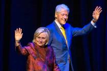 Former U.S. President Bill Clinton and former U.S. Secretary of State Hillary Clinton arrive on ...