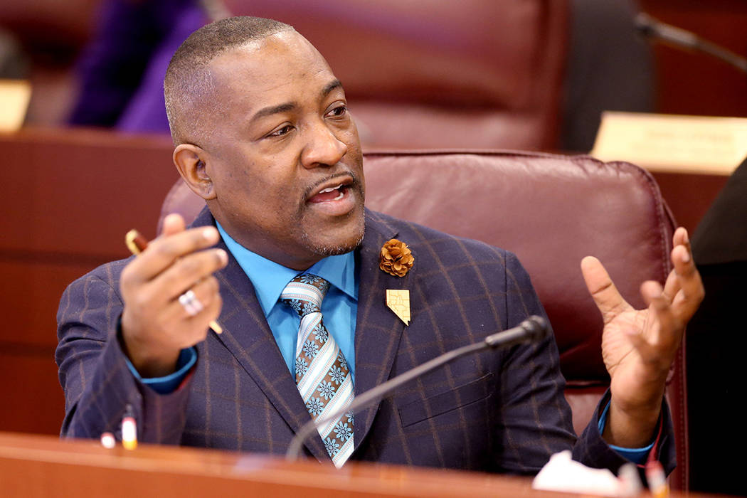 Assemblyman Tyrone Thompson, D-North Las Vegas, prepares for a joint meeting of the Senate Fina ...