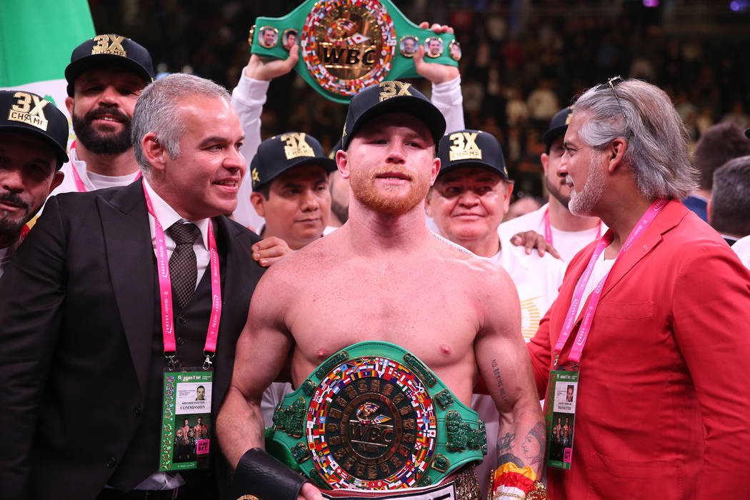 Saul “Canelo” Alvarez, celebrates his win against Daniel Jacobs in the WBC, WBA, ...