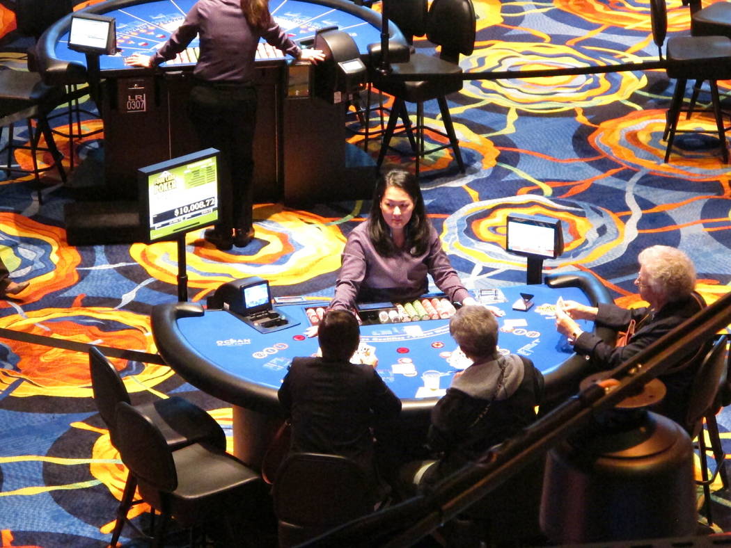 This June 25, 2018 photo shows a card game under way at the Ocean Casino Resort in Atlantic Cit ...