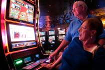 In this June 25, 2018 photo, Joyce Green of Vineland, N.J. reacts to a winning spin at a slot m ...