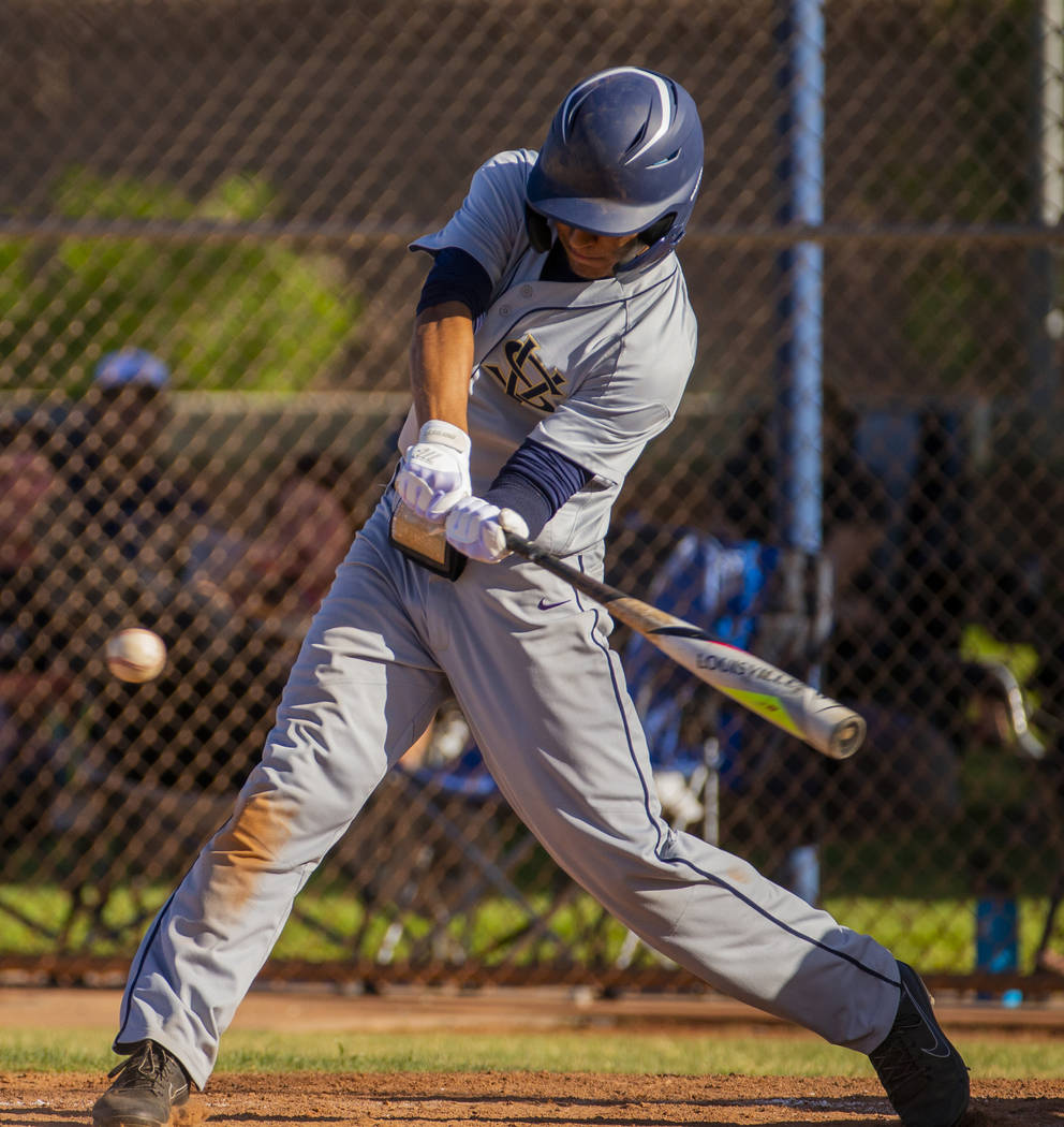 Spring Valley's Chase Rodriguez (22) readies to connect on a pitch versus Liberty during the fi ...