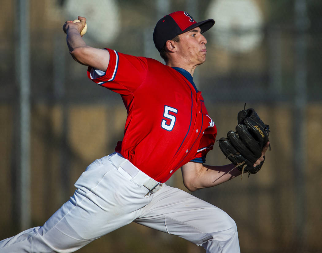 Liberty' pitcher Garrett Maloney (5) finishes off Spring Valley during the first round of the D ...
