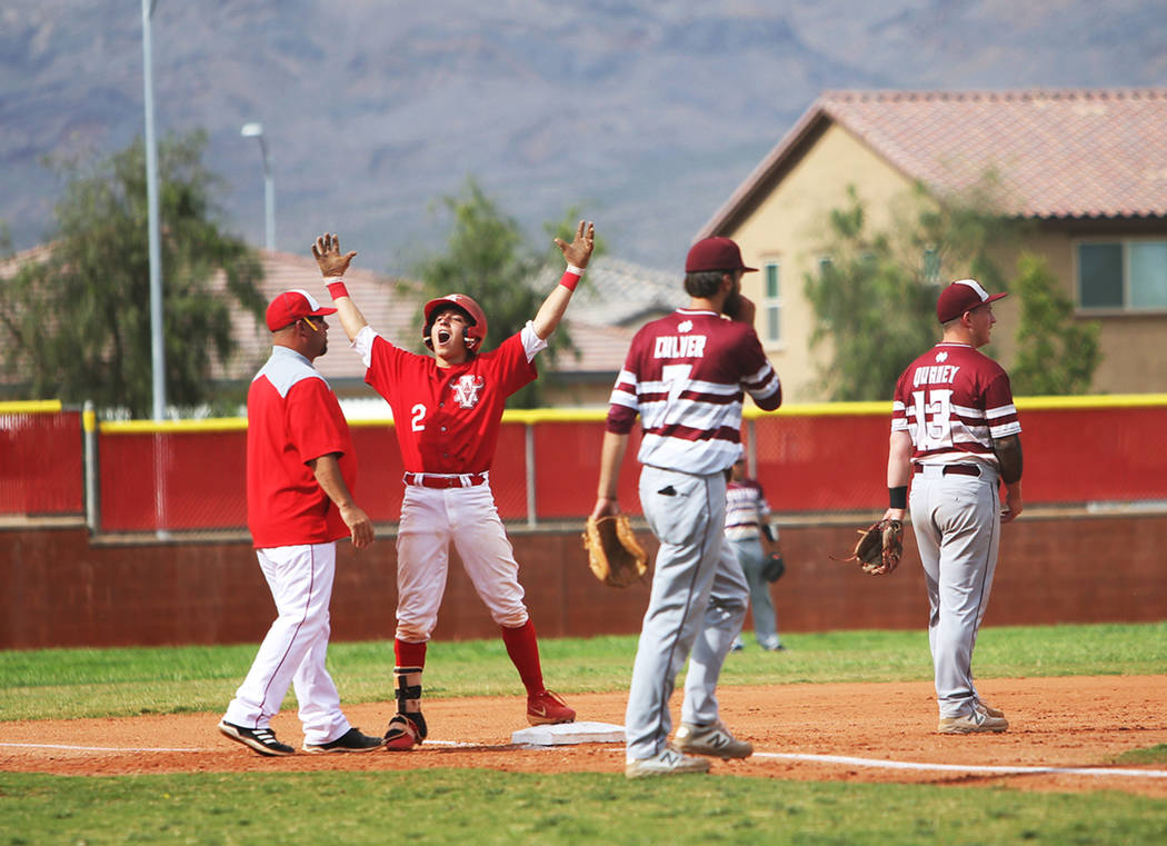 Arbor View's Nicholas Cornman (2) cheers after making it safe to third base in the second round ...