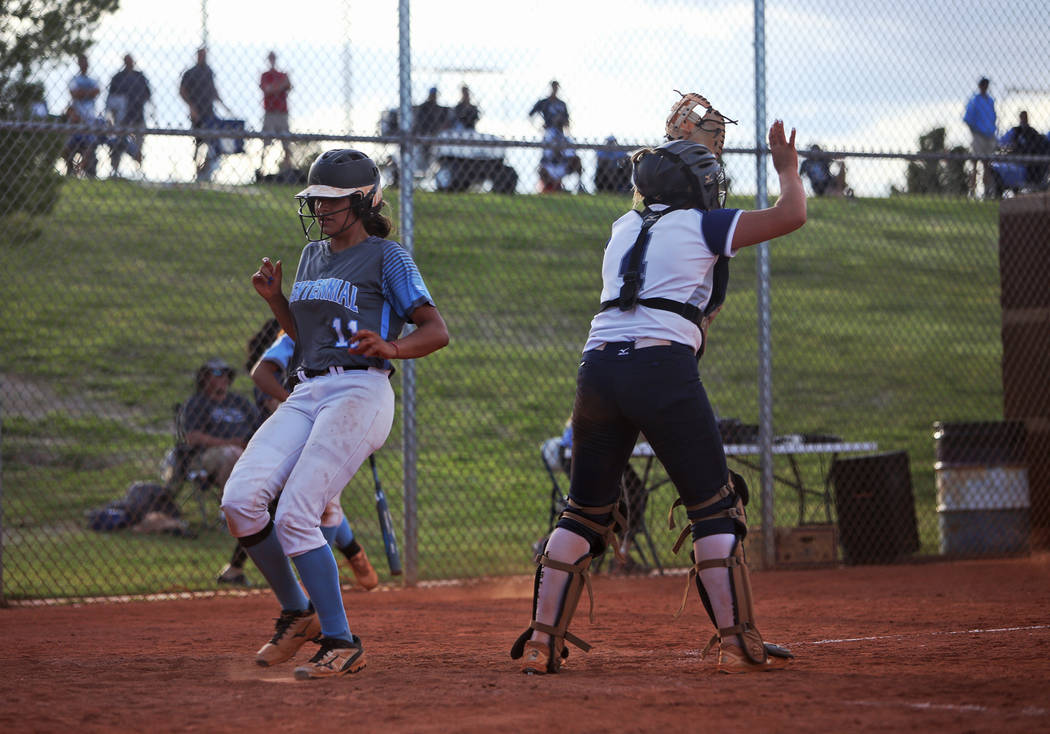 Centennial High School's Jacqueline Perez Mena (11) makes home base against Shadow Ridge High S ...