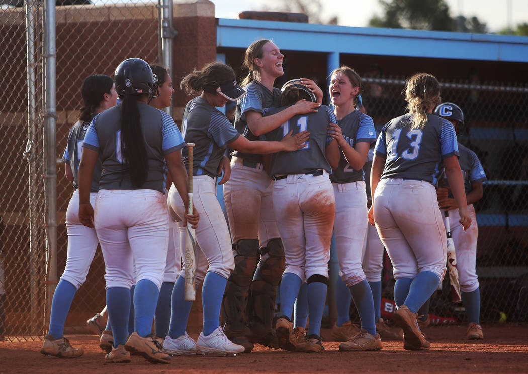 Centennial High School's Jacqueline Perez Mena (11) is applauded by teammates after they evened ...
