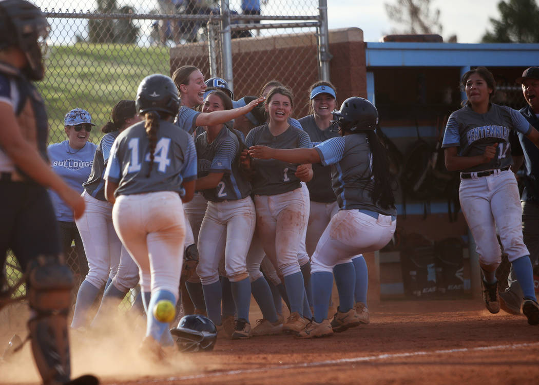 Centennial High School players cheer after winning 3-2 against Shadow Ridge High School in the ...