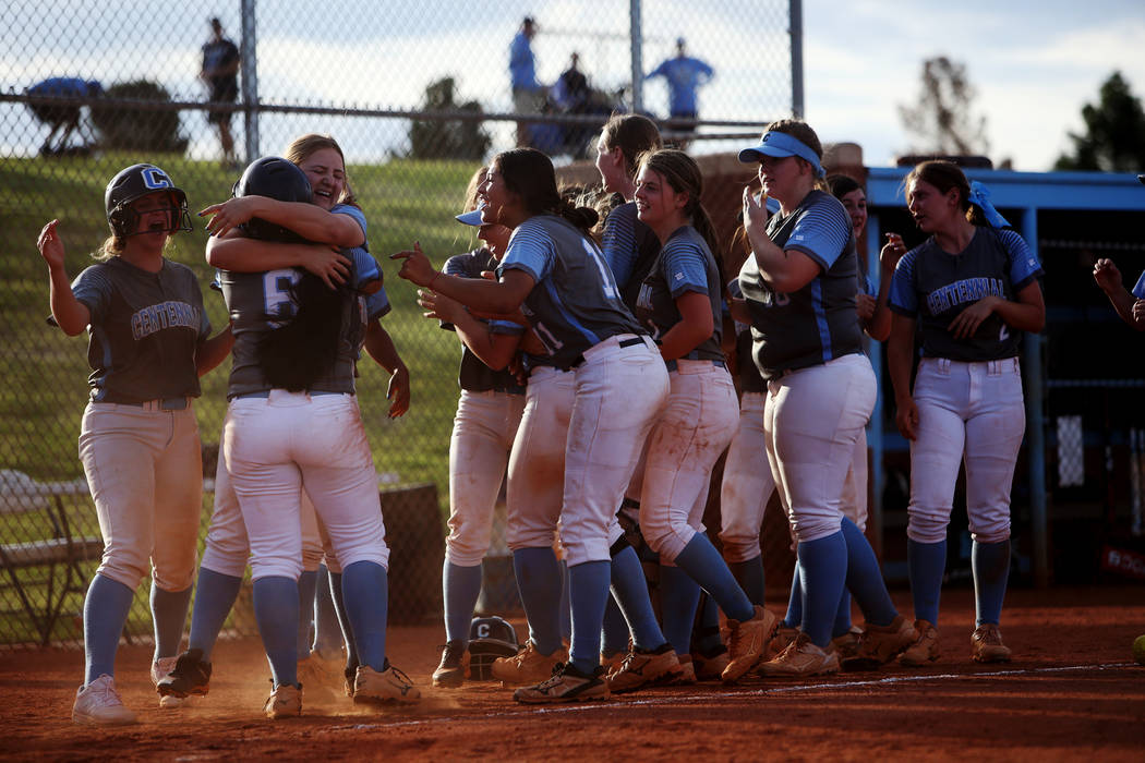 Centennial High School players cheer after winning 3-2 against Shadow Ridge High School in the ...